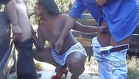 Two trans and black chicks are having fun in the outdoor