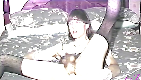 A brunette with a hairy pussy is wearing vintage stockings