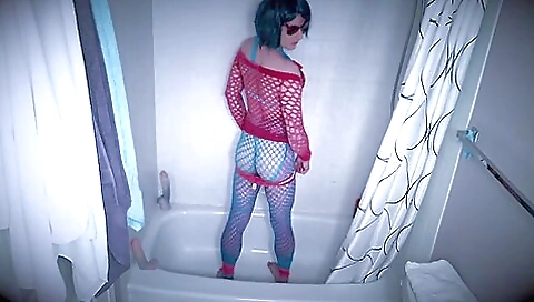 Naked slut wearing stockings masturbates in the shower