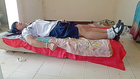 Asian teen in school uniform enjoys the freedom outdoors