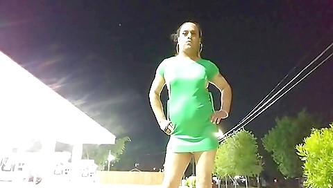 Transvestite porn video with a brunette wearing sexy clothes