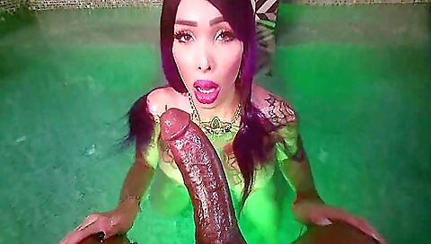 A big ass babe with a great body is giving a blowjob