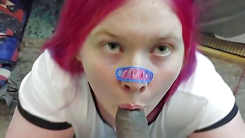 Big tittied redhead is having a deepthroat in her pussy