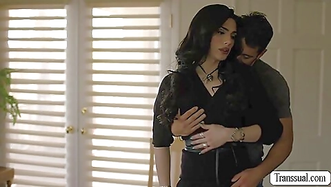 Brunette in a black hoodie and black stockings takes her ass bare